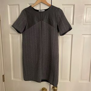 gray quilted and leather top